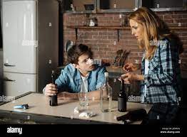 Shocked mother caught her son while drinking beer Stock Photo - Alamy