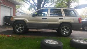 jeep grand cherokee questions larger than stock tires