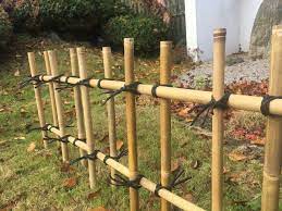At bamboo hardwoods, inc., where i work, we've found that galvanized wire is easier, stronger and lasts longer than string. Four Eye Bamboo Fence Japanese Fence For Oriental Gardens Build A Japanese Garden Uk