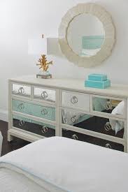 With pulls missing, and the original finish worn down, it was a perfect candidate for paint, glaze and distressing. Mirrored Dresser Contemporary Bedroom Anne Hepfer Designs