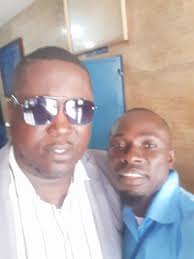 STAND WITH DR ERNEST BAI KOROMA, THE FORMER PRESIDENT OF SIERRA LEONE.