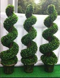 How Artificial Topiaries Can Make Your Space Look Elegant Artificial Topiary Topiary Plants Outdoor Topiary