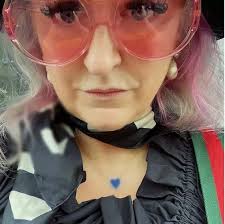 Mum faces £20,000 fine if she refuses to change the colour of her front  door