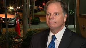 Roy Moore's opponent focused