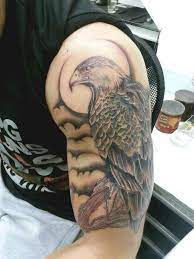 50 Amazing Perfectly Place Eagle Tattoos Designs With Meaning Eagle Tattoo Design Eagle Tattoos Eagle Head Tattoo