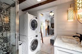 This tiny house also maximized kitchen storage by hanging pots and pans and using open shelving. How To Deal With A Tiny House Bathroom Inspiring Design Ideas Decor Report