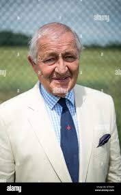Henry Prince, a member of the first Red Arrows' team as he visits the newly  restored gravestone at RAF Fairford of his dog Dusty, who was a mascot of  the team Stock