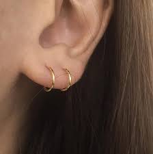 The Filament Hoops Only Require One Ear Piercing But Gives The Illusion Of 2 Layered Hoops Available In Silver Ear Jewelry Earings Piercings 2nd Ear Piercing