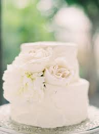 Small White Two Tier Wedding Cake Decorated With Some Cream Toned Flowers I Love How Delicate And S Wedding Cakes Wedding Cake Decorations Small Wedding Cakes