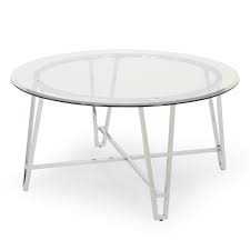 They are home to the latest magazines, house plants, baskets of collected shells, kid's toys and crayons, the remote control and the everyday stuff of our lives. Noble House Arva Round Tempered Glass Top Iron Coffee Table In Silver 310296