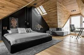 Moderna Mansarda Arredata Con Letto Dalla Struttura Nera Parete Nera Tappeto Grigio Camera Da Letto Moderna Nera Arredamento Camera Da Letto Nera