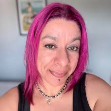 still here she said i was too much— too loud, too soft, too full of ache in  all the wrong places. i watched her leave like i wasn't worth a goodbye,  just