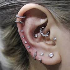20 Gorgeous Daith Piercings That Will Make You Book An Appointment Asap Earings Piercings Ear Piercing Studs Cute Ear Piercings