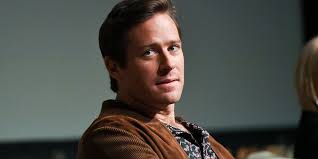 Armie Hammer Plays 'Kannibal Ken' In New Music Video, Taking A Swing At  Past Scandal