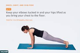 Woman Doing Knees Chest And Chin Pose Yoga Essential Yoga Poses Yoga Poses Yoga Backbend