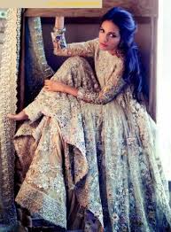 It speaks of the traditions and cultures of the one who has the dress draped on her. Elan Garden Of Evening Mists Bridal Couture 2014 2015 Indian Wedding Dress Indian Wedding Dress Modern Pakistani Bridal Dresses