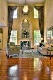 Dramatic Two Story Great Room From Eastwood Homes Building New Homes In North Carolina South Carolina Window Treatments Living Room Home Living Room Windows