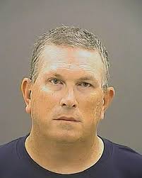 Baltimore police officer Wesley Cagle guilty of assault, gun charges
