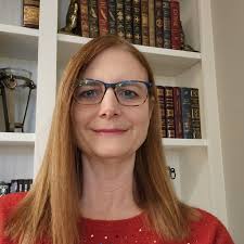 Why do many adult readers like YA science fantasy books?