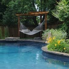 Stylish Pool Fence Ideas With Material Options Guide Backyard Pool Pool Decor Backyard Hammock
