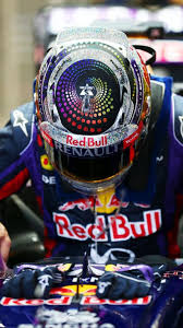 It could well be sebastian vettel. F1 Considering Ban On Helmet Livery Changes