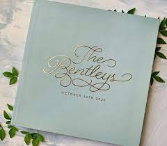 Framed guest book which includes little hearts for guests to sign and slip into the wooden frame. The Best Etsy Wedding Guest Books Junebug Weddings