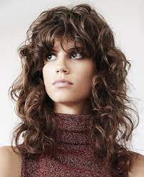 70s Hairstyles Best Ways To Do 70s Hair Thehairstyledaily Long Shag Hairstyles Long Shag Haircut Curly Hair Styles