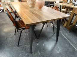 5.0 out of 5 stars. Wood And Iron Dining Table Features A Wood Top And Metal Legs