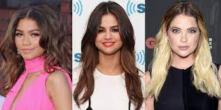 The combination of a top bun with wavy hair is very popular among the young generation. 11 Easy Wavy Hairstyles For 2018 How To Get Beach Waves For Summer