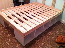 I searched high and low for a bed frame online for tegan, and since i am (way) too picky about all things, i couldn't find one that was just right. Diy Storage Bed Diy Storage Bed Diy Bed Frame Furniture Diy