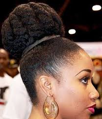 This natural flower hairdo is a seamless piece of the beauty. African American Updo Hairstyles New Natural Hairstyles