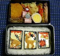 framed pictures over rice pig deer butterfly from http charaben at webry info 200611 article 23 html japanese food art bento recipes food