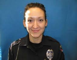 At Wisconsin slain officer's funeral, 2 families grieve