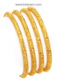 Buy 22k Gold Bangles Set Of 4 2 Pair Gbl1136 With A List Price Of 2 278 99 22k Indian Gold Jewelry From 22k Gold Bangles Gold Bangle Set Gold Bangles