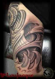 All tattoo lovers are familiar with the biomechanical style. Lou Jacque Clockwork Tattoo Art Gallery