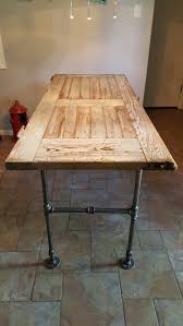Old Barn Door Turned Into A Table With Pipes Ev Duzenleme Ev Icin Dekor