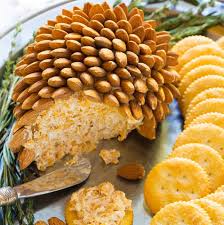 This christmas crudités platter has an amazing dip. Pinecone Cheese Ball From The Pioneer Woman Cheese Ball Holiday Appetizers Holiday Cheese
