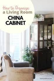 Place a curio cabinet in a living room to display collectibles. How To Organize A China Cabinet In The Living Room Idea