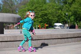 Read more skater blurry wallpaper : Pictures Little Girls Smile Bokeh Child Roller Skates Eyeglasses