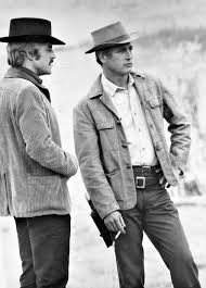 In 1930s gangland chicago, two handsome, sneaky crooks (paul newman and robert redford) were swindling another handsome, far more sinister crook (robert shaw). Unbeatable Duo Sundance Kid Paul Newman Robert Redford Paul Newman