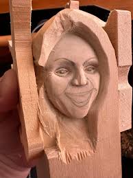 Did the older couple who sold wood carvings