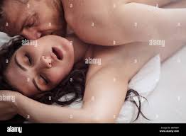 Close up shot of passionate young couple having sex on bed Stock Photo -  Alamy