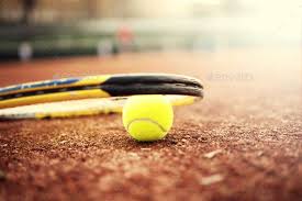 Close Up Of Tennis Ball And Racket On Clay Court Summer Day At Tennis Court Tennis Ball Tennis Tennis Court