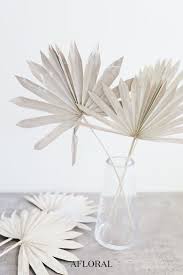 The main factors that effect them are light or humidity. Preserved Whitewashed Palm Leaves In Glass Vase Dried Flowers How To Preserve Flowers Dried Flower Bouquet