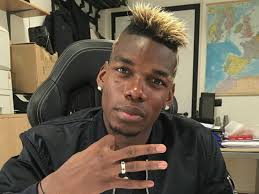 His hairstyles usually featured a mohawk model, with polish on the sides of the head. Hair Is Burning Paul Pogba Shows Off New Outrageous Hairdo With Manchester United Superstar To Complete Suspension Mirror Online