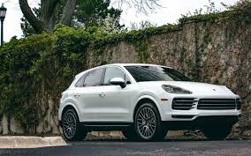 The cayenne's steering is quite heavy, but it feels very well connected for a large suv, while the huge amount of grip and good body control means you can cover ground very swiftly. Comparison Seat Ateca Cupra 2018 Vs Porsche Cayenne S E Hybrid Platinum 2019 Suv Drive