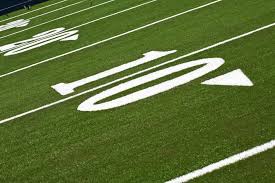 If the ball is located between yard markers, which yard line is displayed on the scoreboard and is the running back credited for a yard gain or not? Free Stock Photo Of Football Field Online Download Latest Free Images And Free Illustrations