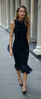 Navy Ribbed Midi Sweater Dress With Pearl And Crystal Embellishments Classic Black Pumps And A Black Crossbody Ba Fashion Sweater Dress Midi Ribbed Midi Dress