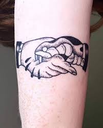 15 Handshake Tattoo Designs The Hand That Bites Tattoo Petpress In 2020 Tattoo Designs Tattoos Snake Tattoo Design