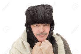 Check spelling or type a new query. Elderly Man In Fur Hat With Ear Flaps Covers His Ears From The Cold Stock Photo Picture And Royalty Free Image Image 66062721